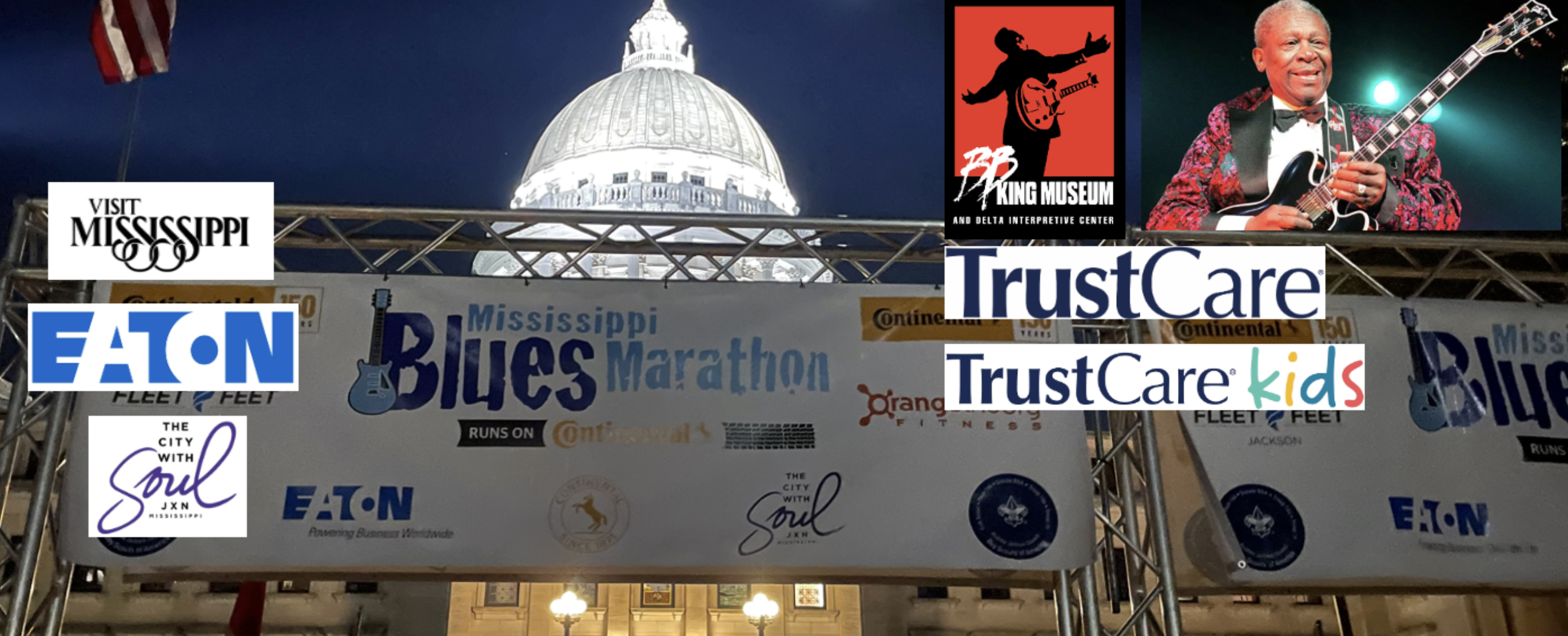 Mississippi Blues Marathon" logo with a blue guitar graphic on the left.